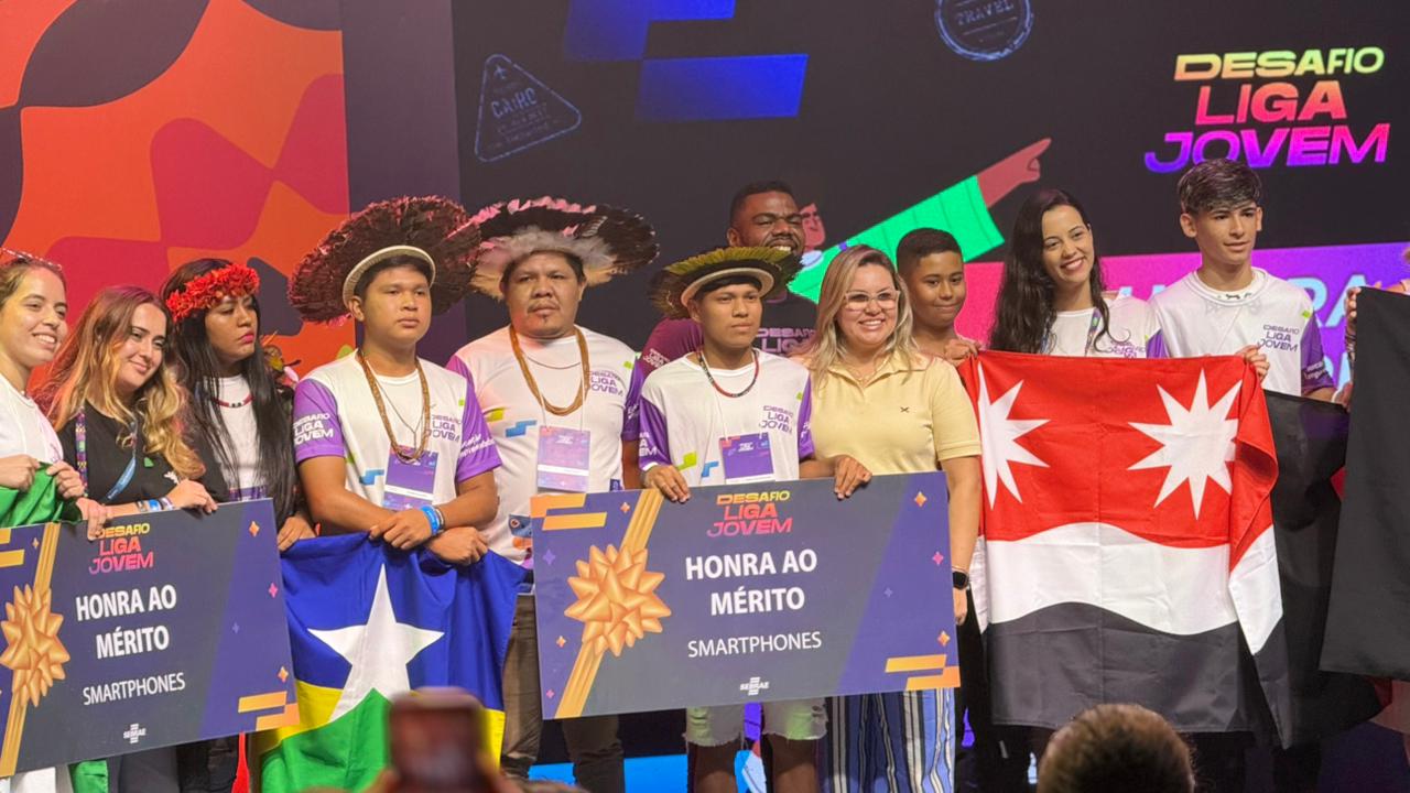 Equipe Originários recebe o prêmio Honra ao Mérito na 3ª edição do Desafio Liga Jovem, realizada durante a COP30, reconhecendo a representação de Rondônia com inovação, cultura e identidade indígena no cenário internacional.